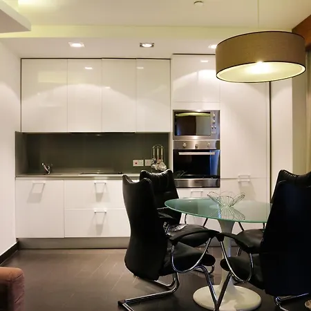 Отель The Seafront Tower Suites Слима